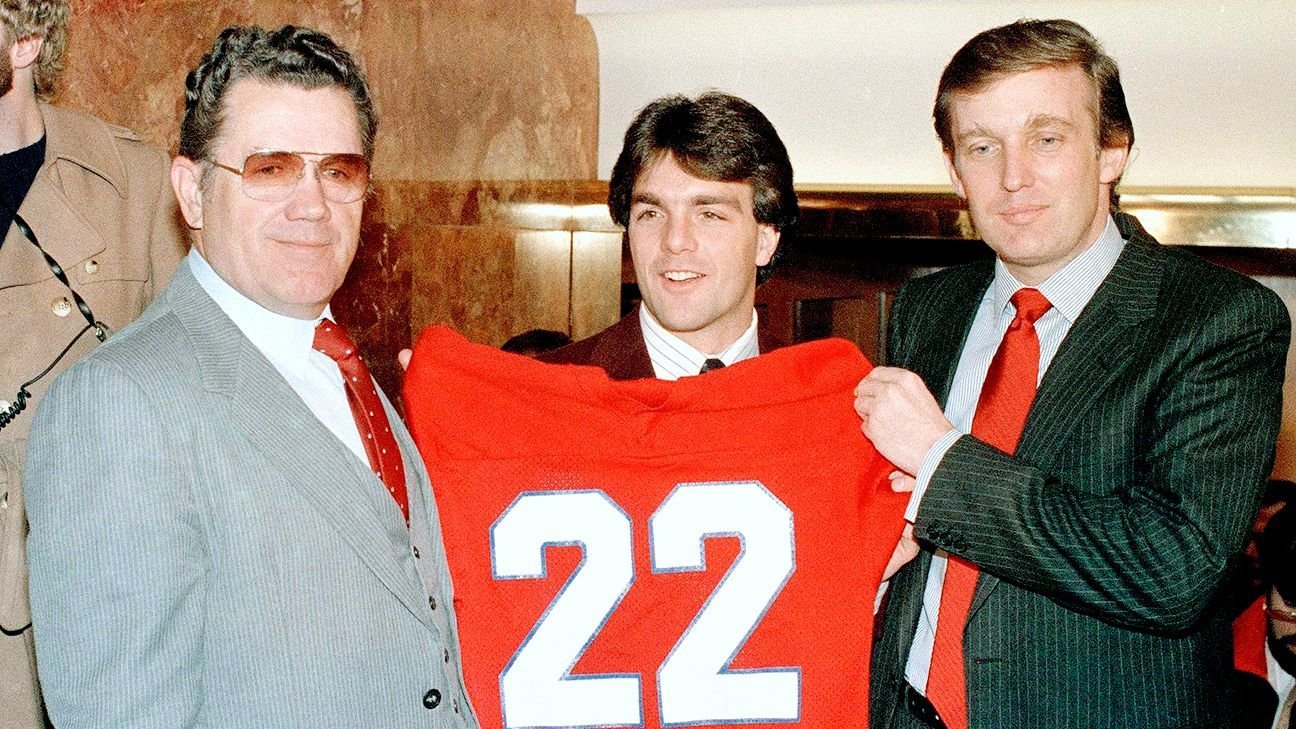 Donald Trump (right) at the February 1985 signing ceremony that brought Heisman Trophy winner Doug Flutie, center, to his New Jersey Generals. Team’s head coach, Walt Michaels, is on the left.