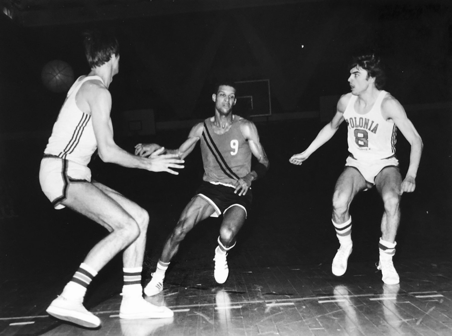 Kent Washington in action against Polonia, a rival team in the Polish Basketball League. In 1979, he became the first American pro to sign up behind the iron curtain.