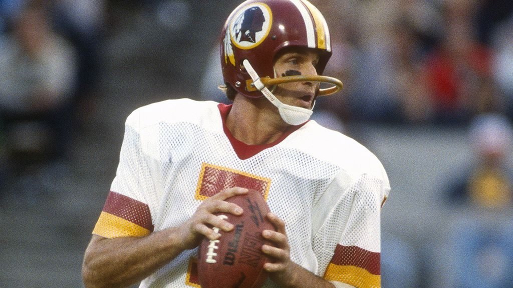 Joe Theismann in action with the Washington Redskins. One of the leading quarterbacks of the 1980s, Theismann was a Heisman Trophy contender at Notre Dame and a Super Bowl champ with the Redskins.