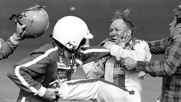 Drivers Bobbie Allison and Cale Yarborough brawling after a crash at the 1979 Daytona 500, the first race to be televised live from start to finish. The images helped launch NASCAR into a national juggernaut.