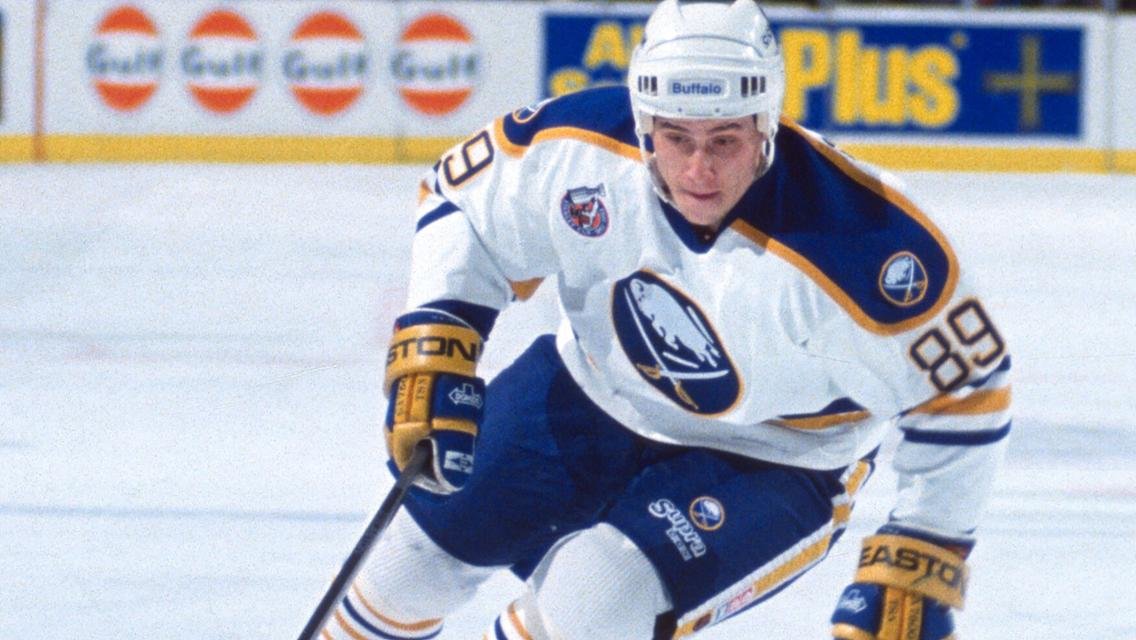 Alexander Mogilny in action with the Buffalo Sabres, who recruited him while he was still playing behind the iron curtain. In 1989, he became the first Soviet hockey player to defect to the West.